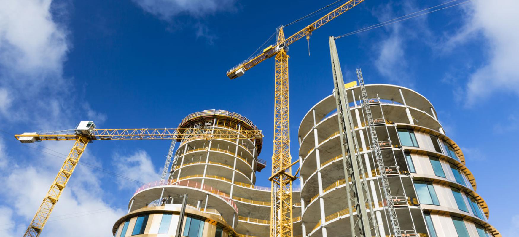 Engineers reviewing blueprints